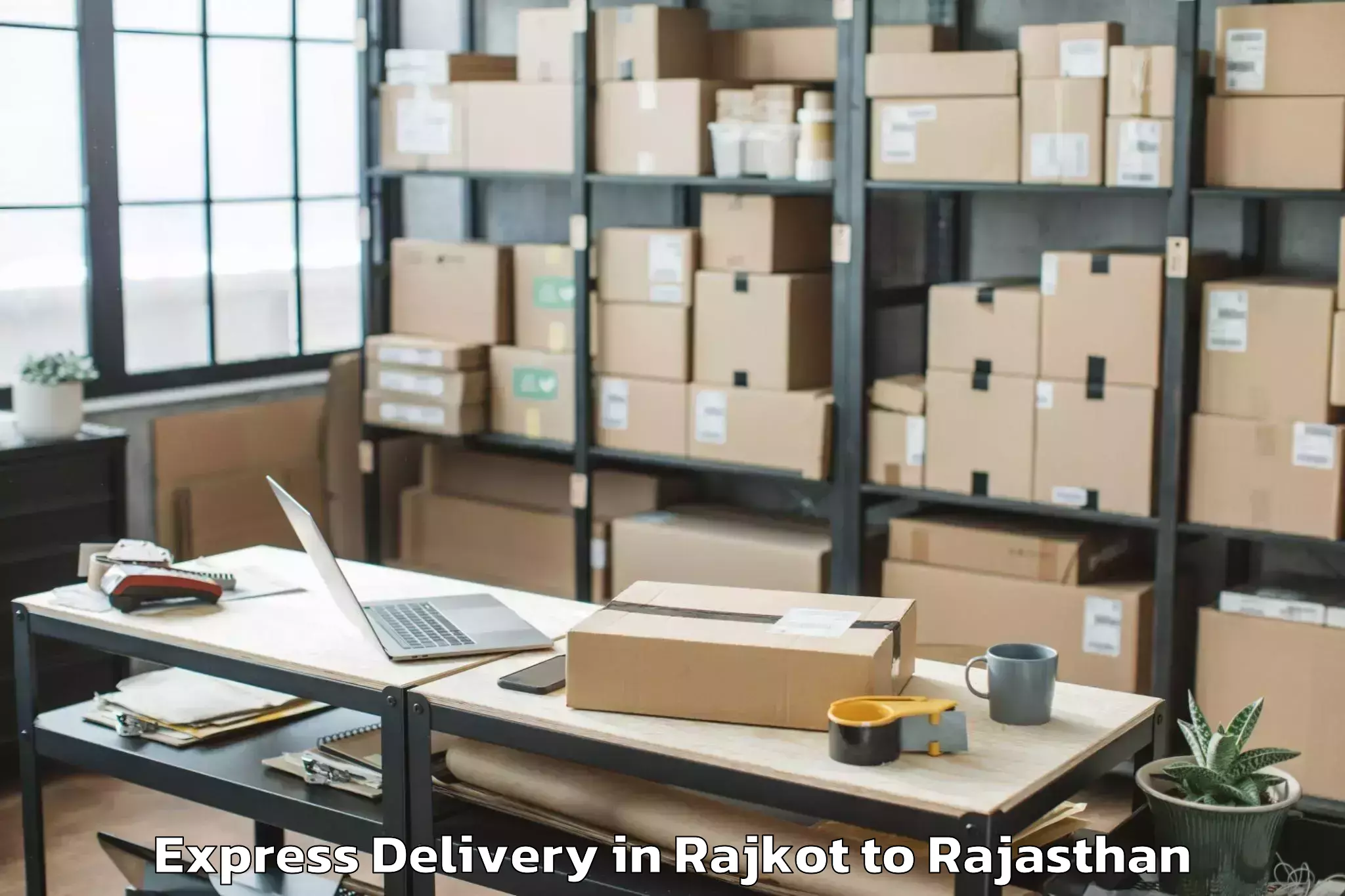 Professional Rajkot to Khairthal Express Delivery